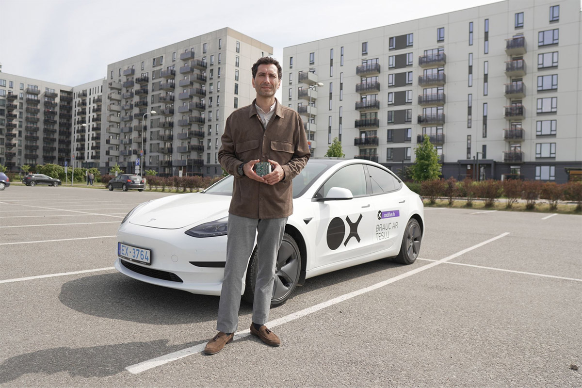 Our client Vaho Iashvili holds a VOOBOX board on device testing with a large carsharing company OX Drive in Latvia